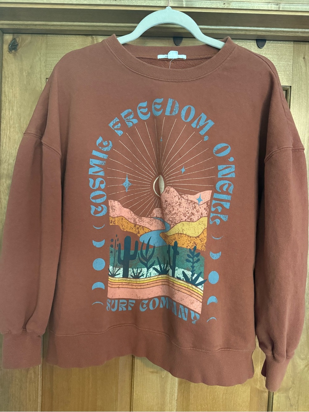 O'Neill Rust Crewneck with Multicolor Desert Graphic